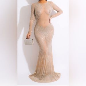 From a online boutique, very sparkly and hugs the body a bit.